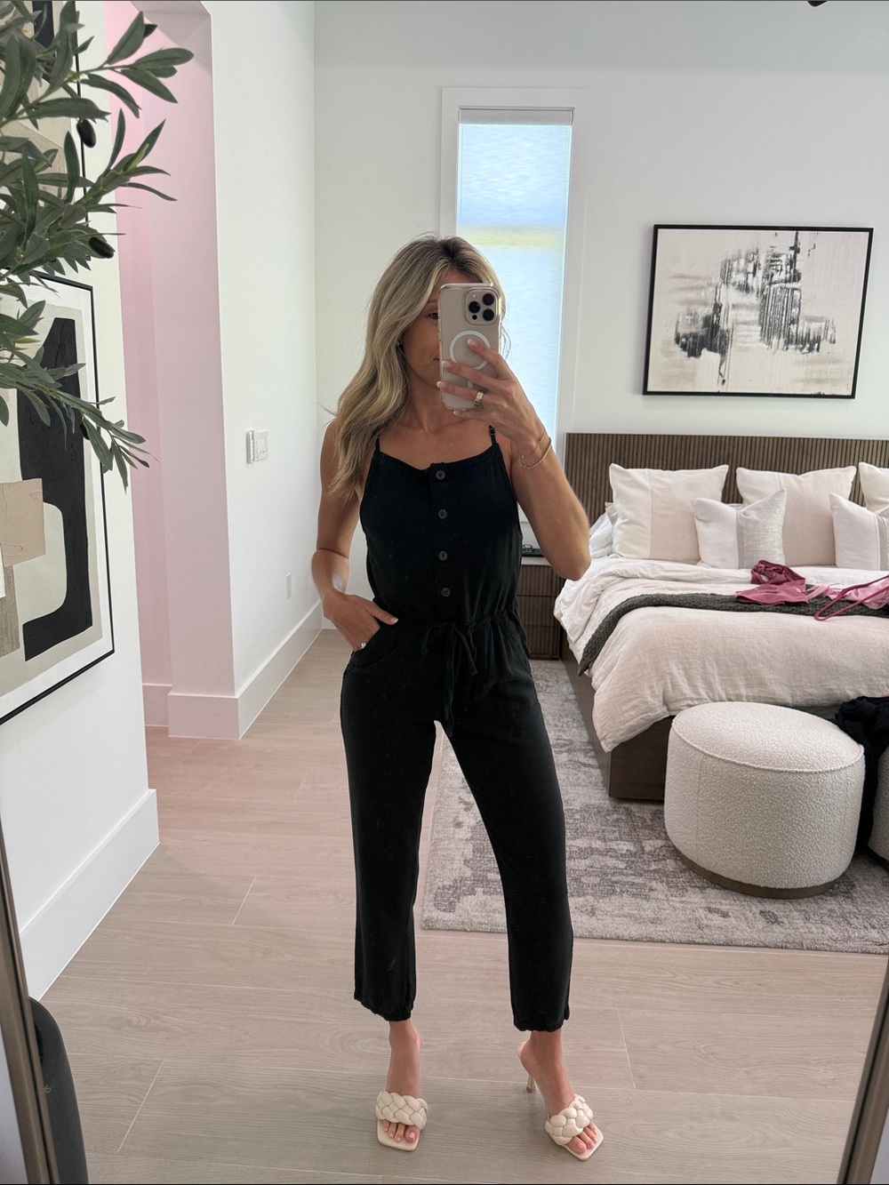 Black Sleeveless Button-Front Jumpsuit